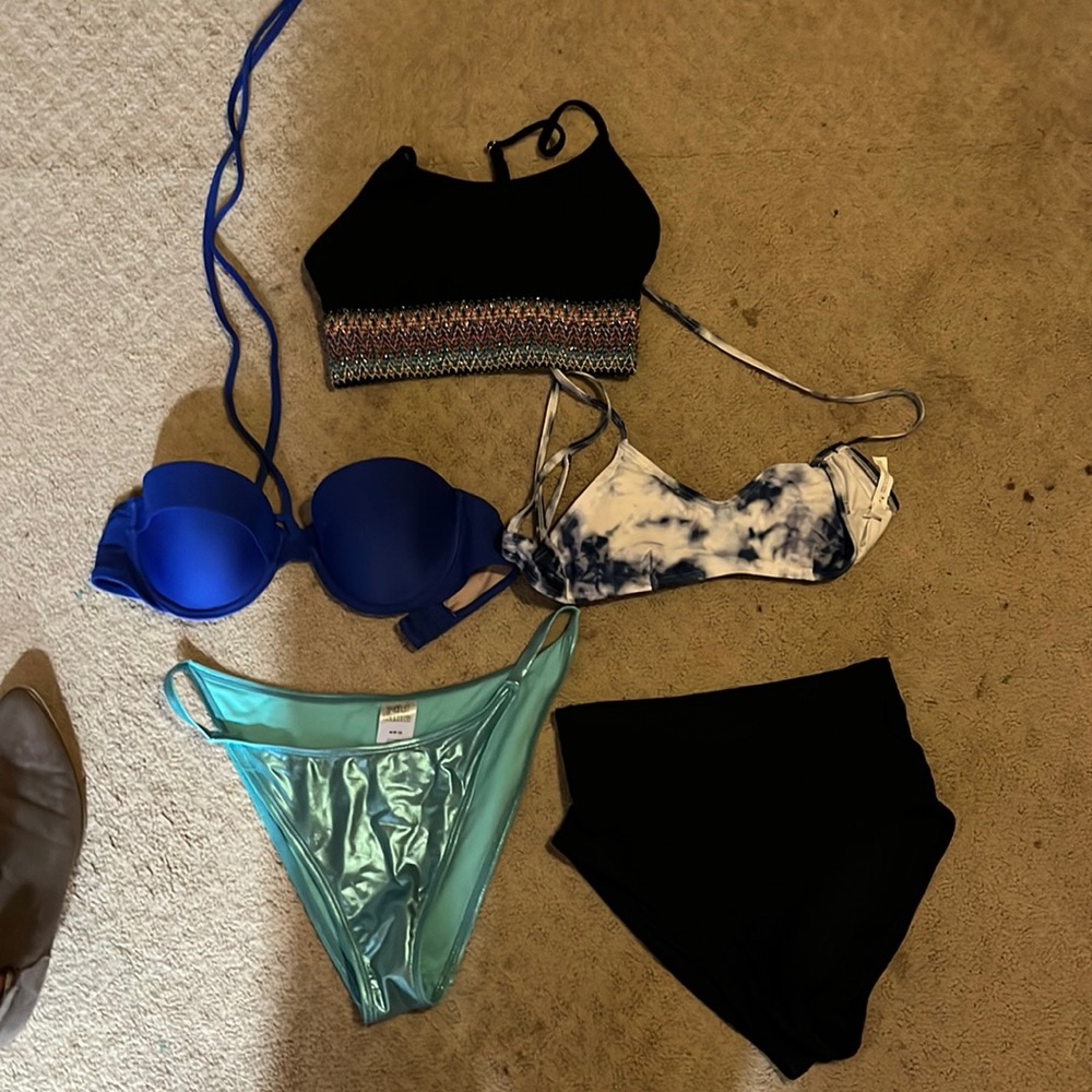 bundle of random bikini tops and bottoms